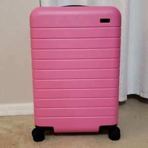Away x Flour Shop Hot Pink Bigger Carry On luggage